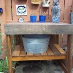 repurposed pallet garden work bench with shelf