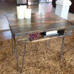 repurposed pallet end table with storage and metal hairpin legs.