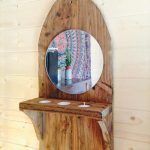 Repurposed pallet wall mirror with triple candle holder