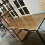 Wooden pallet and metal desk